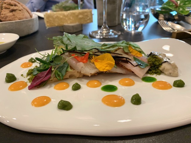 Come una terra marina: strati di crudo di mare